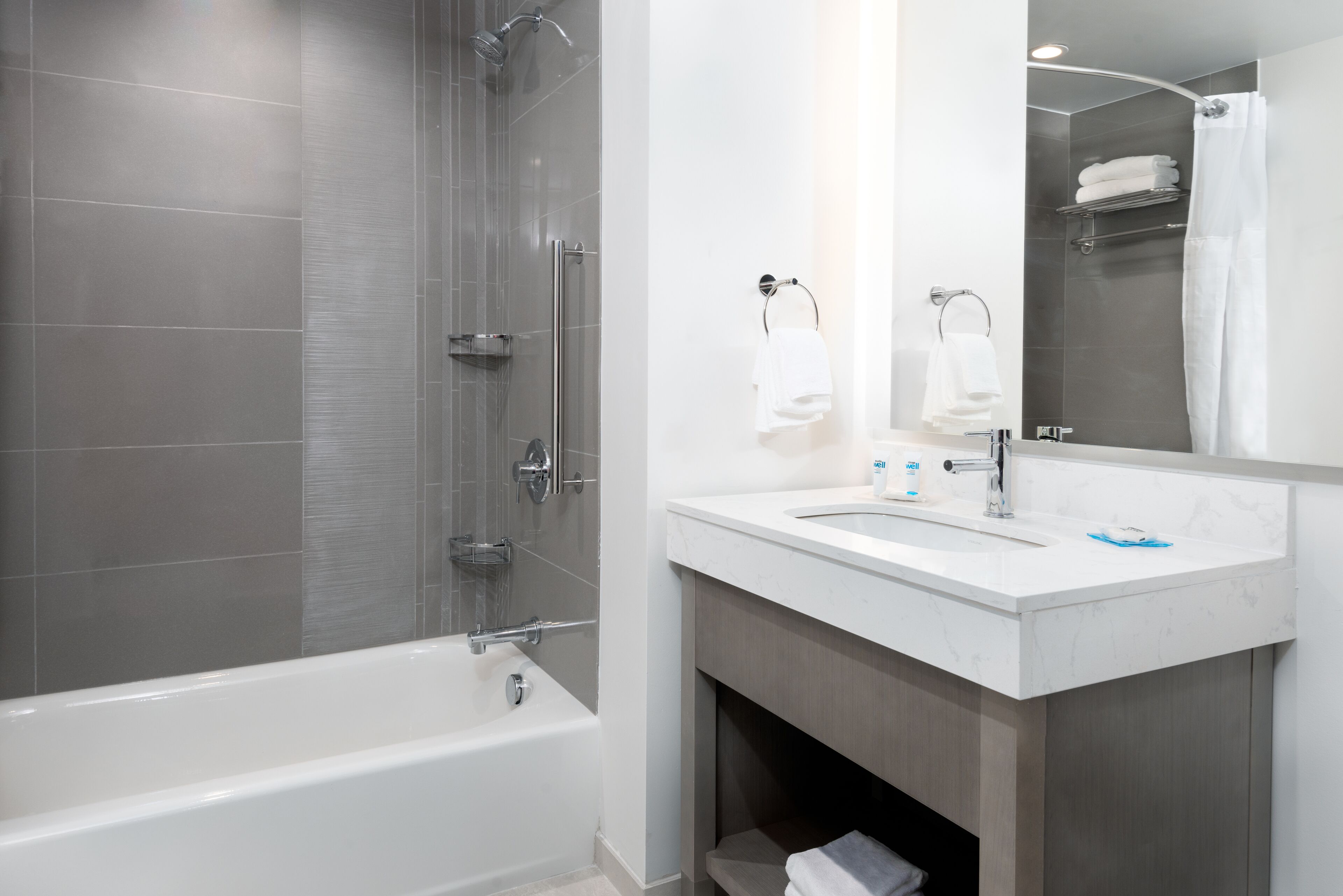 room, 2 queen beds (den) | bathroom | free toiletries, hair dryer, towels