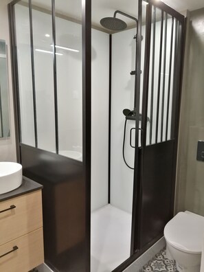 Shower, hair dryer, towels, soap