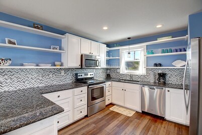 Pet friendly with yard, gulf breezes, close beaches and a private pool!