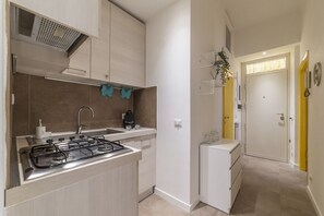 Private kitchen - Elegant and modern 60sqm apartment that can accommodate up to 4 people. Located on the third floor, with elevator (not suitable for disabled people), of a characteristic building in San Lorenzo area, the apartment is about 15 minutes walk from Termini St (Roma)