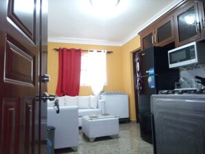 Standard Apartment | Living area | TV - Estudio Vegano (La Vega)