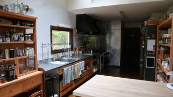 Fridge, microwave, cookware/dishes/utensils