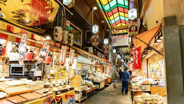 A bustling market with various stalls selling food and goods. - Connect inn Kujo Kawaramachi (Kyoto)