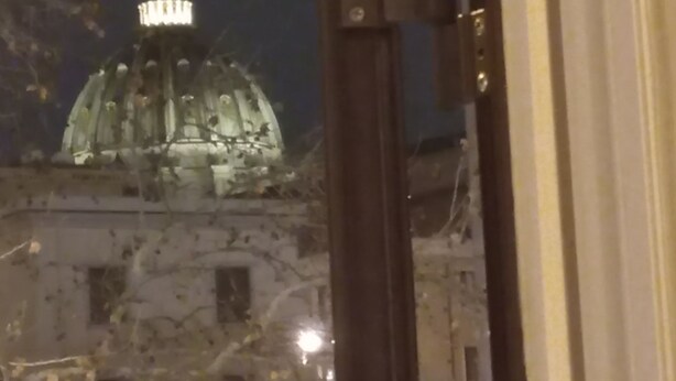A view of the United States Capitol building at night.