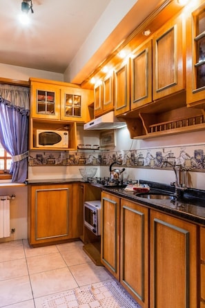 Apartment | Private kitchen | Fridge, microwave, oven, stovetop