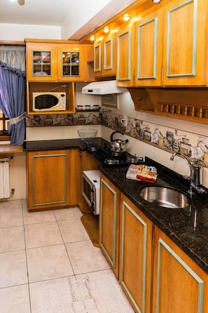 Apartment | Private kitchen | Fridge, microwave, oven, stovetop