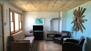 Living area - Presque Isle Resort cottage #2 of 2 (3) (Alpena)