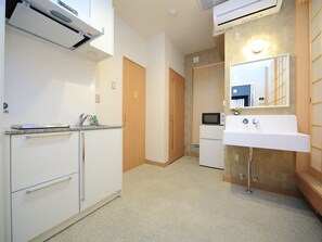 Fridge, microwave, cookware/dishes/utensils