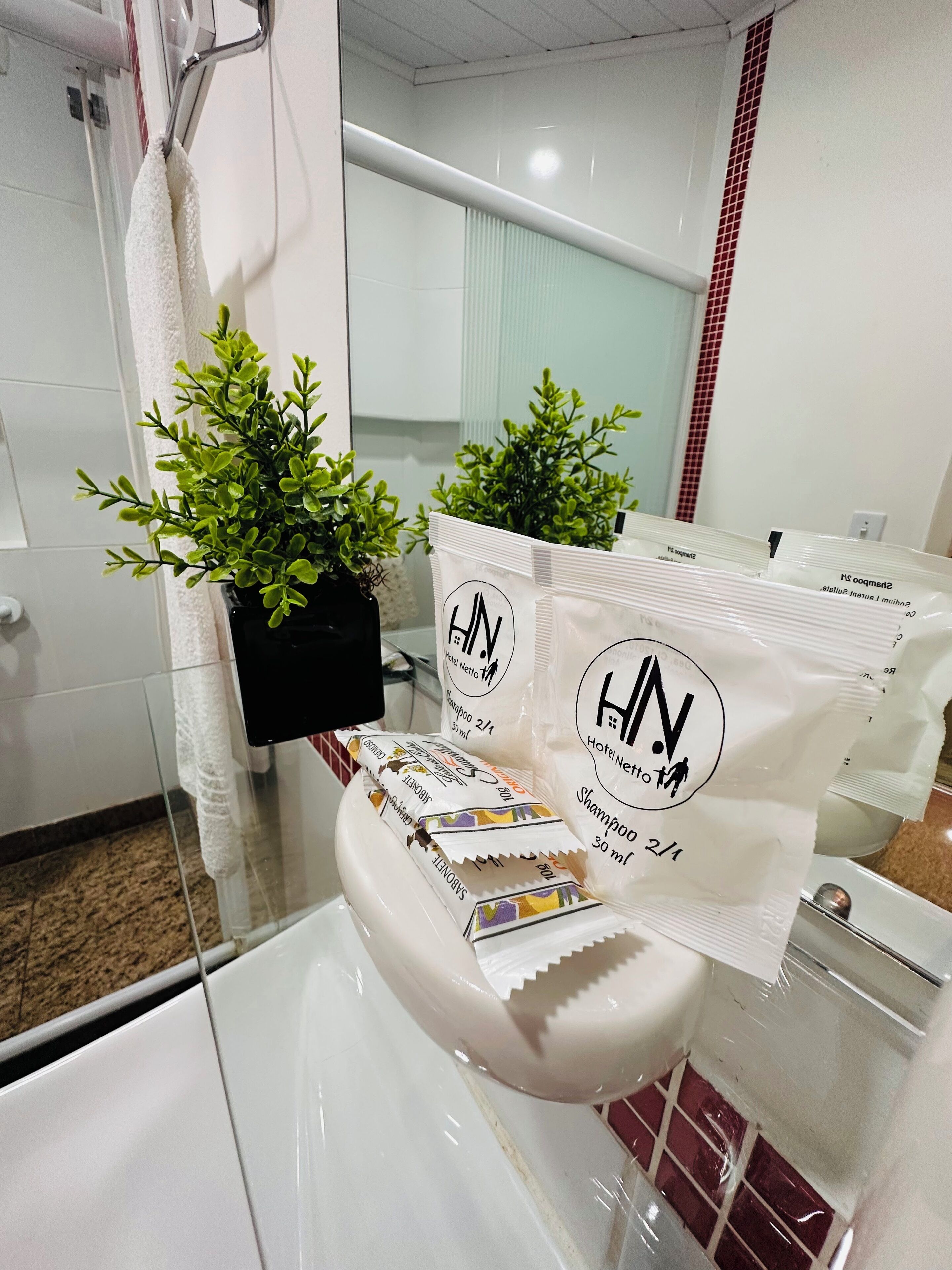 standard triple room | bathroom | shower, hair dryer, towels, soap