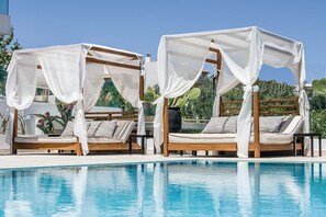 Outdoor pool, a heated pool - Deluxe Junior Suite - Made of Blue Luxury Suites Colection (rethymno)