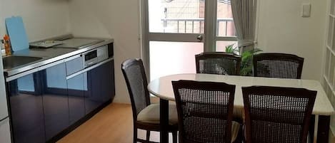 Fridge, microwave, electric kettle, cookware/dishes/utensils