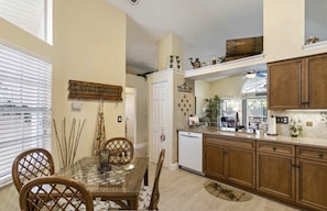 Kitchen dinning table and front entrance 