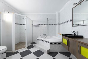 Bathtub, hair dryer, towels