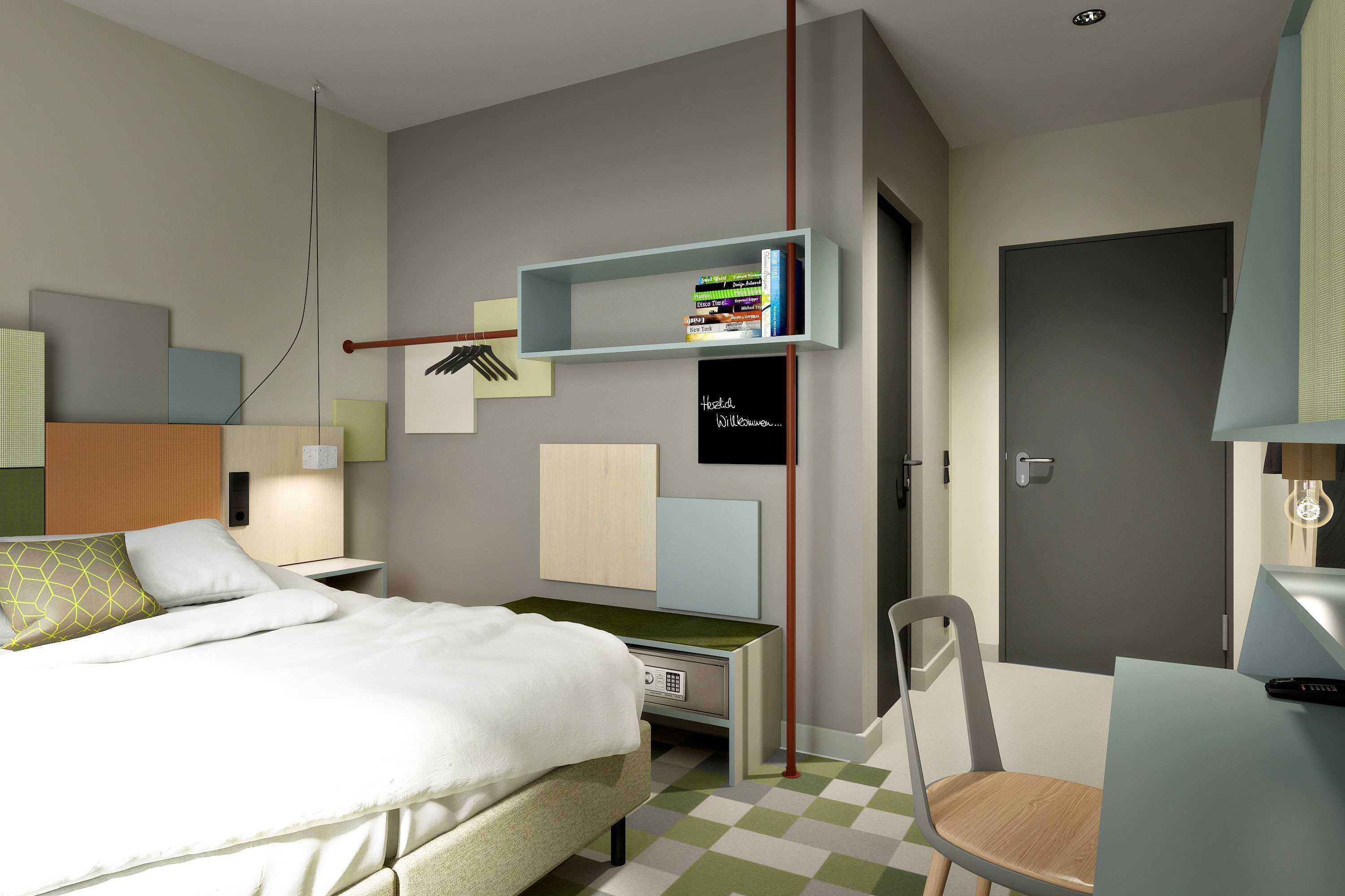 Une chambre d’hôtel moderne équipée d’un lit, d’une table de chevet, d’un bureau, d’une chaise et d’une bibliothèque.