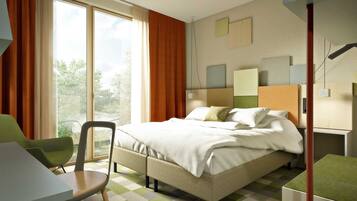 A modern hotel room with a bed, a desk, and a chair.