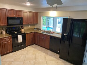 Fridge, microwave, oven, stovetop - 3 bedroom, 2 bathroom private pool home just minutes from Siesta Key! (Sarasota)