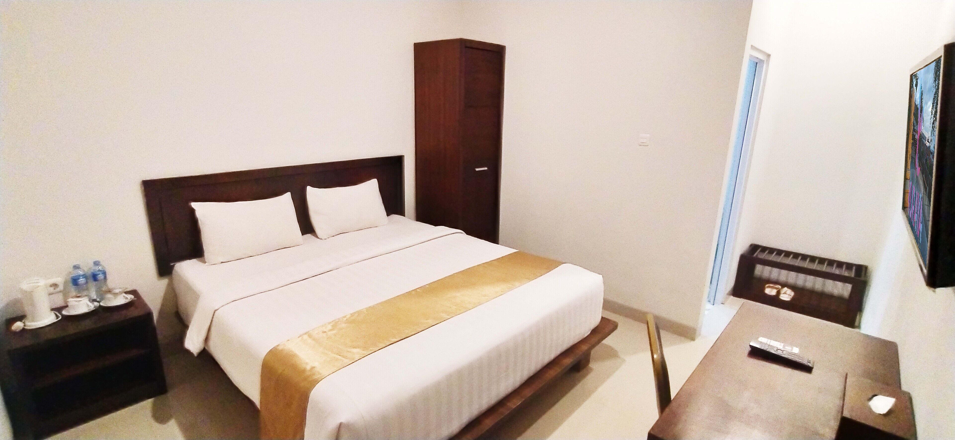 Suite Deluxe, balcó | Escriptori, habitacions insonoritzades, wifi gratuïta i roba de llit 