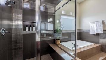 Shower, hair dryer, towels, shampoo