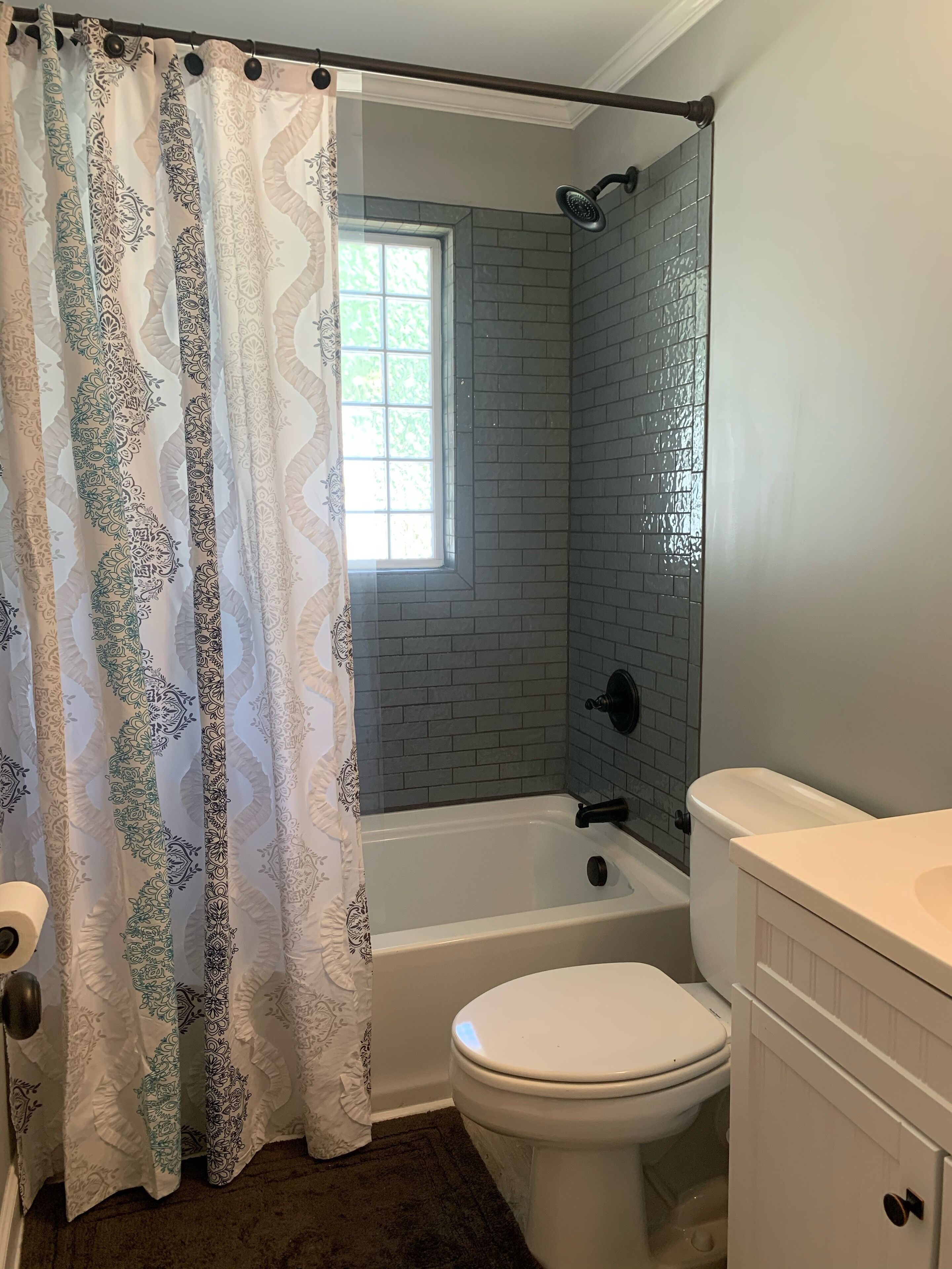 Combined shower/tub, hair dryer, towels, soap