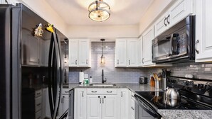 Private kitchen - Experience the best of St. Simons Island from this bright and breezy coastal condo, perfectly located near beaches, shops and dining. (St Simons)