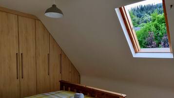2 bedrooms, desk, iron/ironing board, travel crib