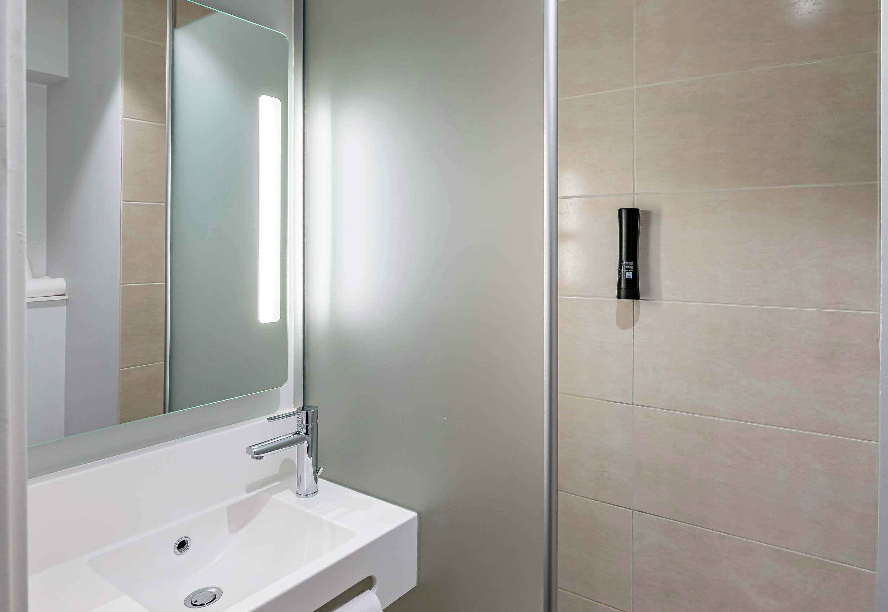 shower, towels, soap, toilet paper