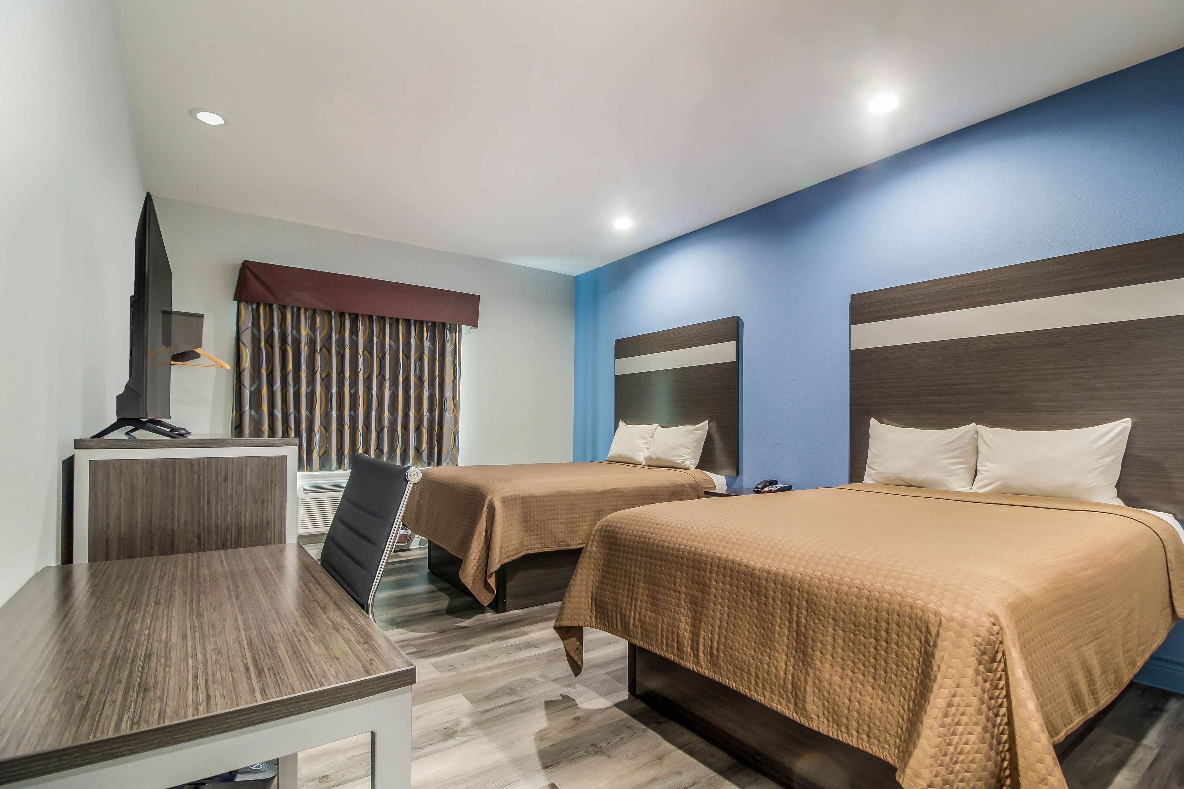 Premium bedding, down comforters, pillowtop beds, desk