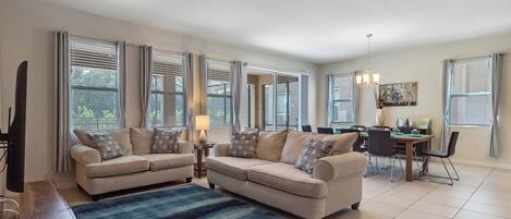 Flat-screen TV, DVD player, ping pong