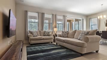 Flatscreentelevisie, een dvd-speler en een tafeltennistafel