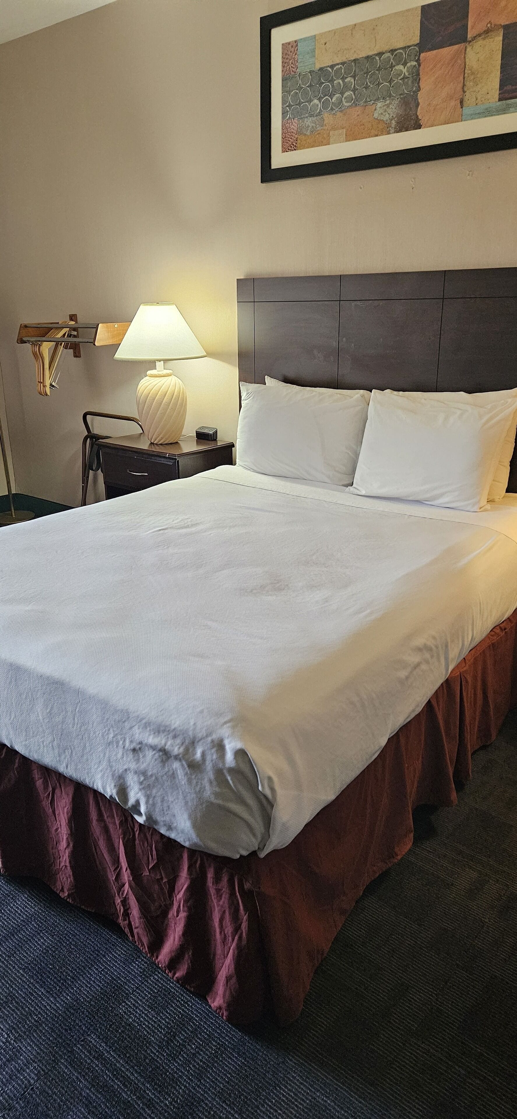 deluxe room, 1 queen bed | desk, laptop workspace, blackout curtains, iron/ironing board