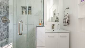 Hair dryer, towels, soap, shampoo