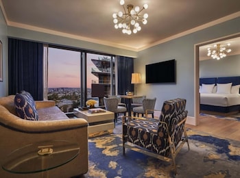 Premium bedding, down comforters, pillowtop beds, minibar at The Sun Rose West Hollywood