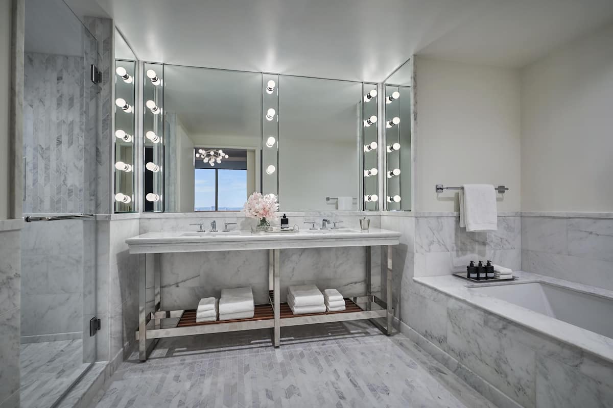 shower, designer toiletries, hair dryer, bathrobes