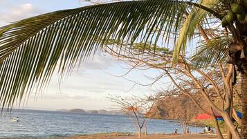 On the beach, sun-loungers, beach towels