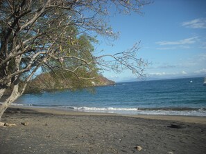 On the beach, sun loungers, beach towels