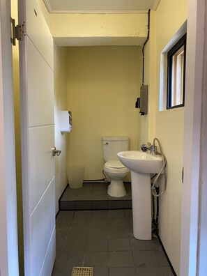 Shower, free toiletries, hair dryer, slippers