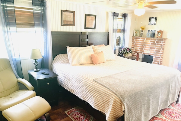 Master Bedroom has a king size bed , also has a 24 inch smart TV in bedroom