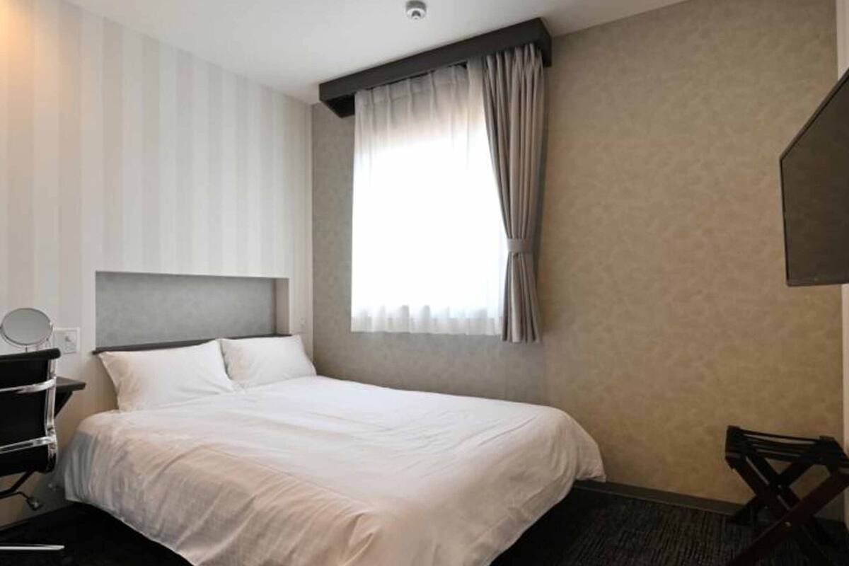 Kamar Double Standar | Selimut bulu angsa dan Wi-Fi gratis