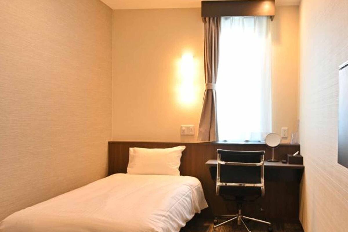 Kamar Single Standar | Selimut bulu angsa dan Wi-Fi gratis