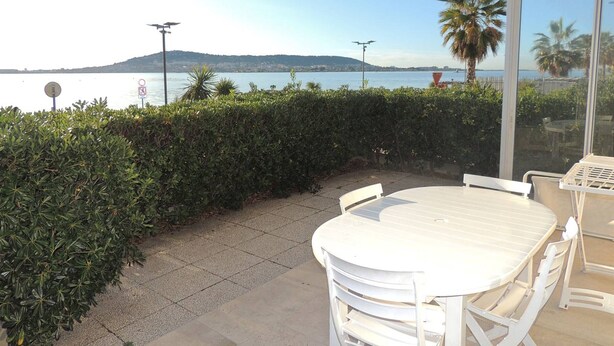 Outdoor dining - 3-Star F2 w/ Parking, Terrace, & Thau Lagoon View near Thermal Baths (Balaruc-les-Bains)