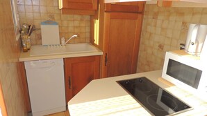 Private kitchen - 3-Star F2 w/ Parking, Terrace, & Thau Lagoon View near Thermal Baths (Balaruc-les-Bains)