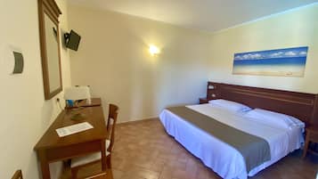 Luxe beddengoed, donzen dekbedden, een minibar, een kluis op de kamer