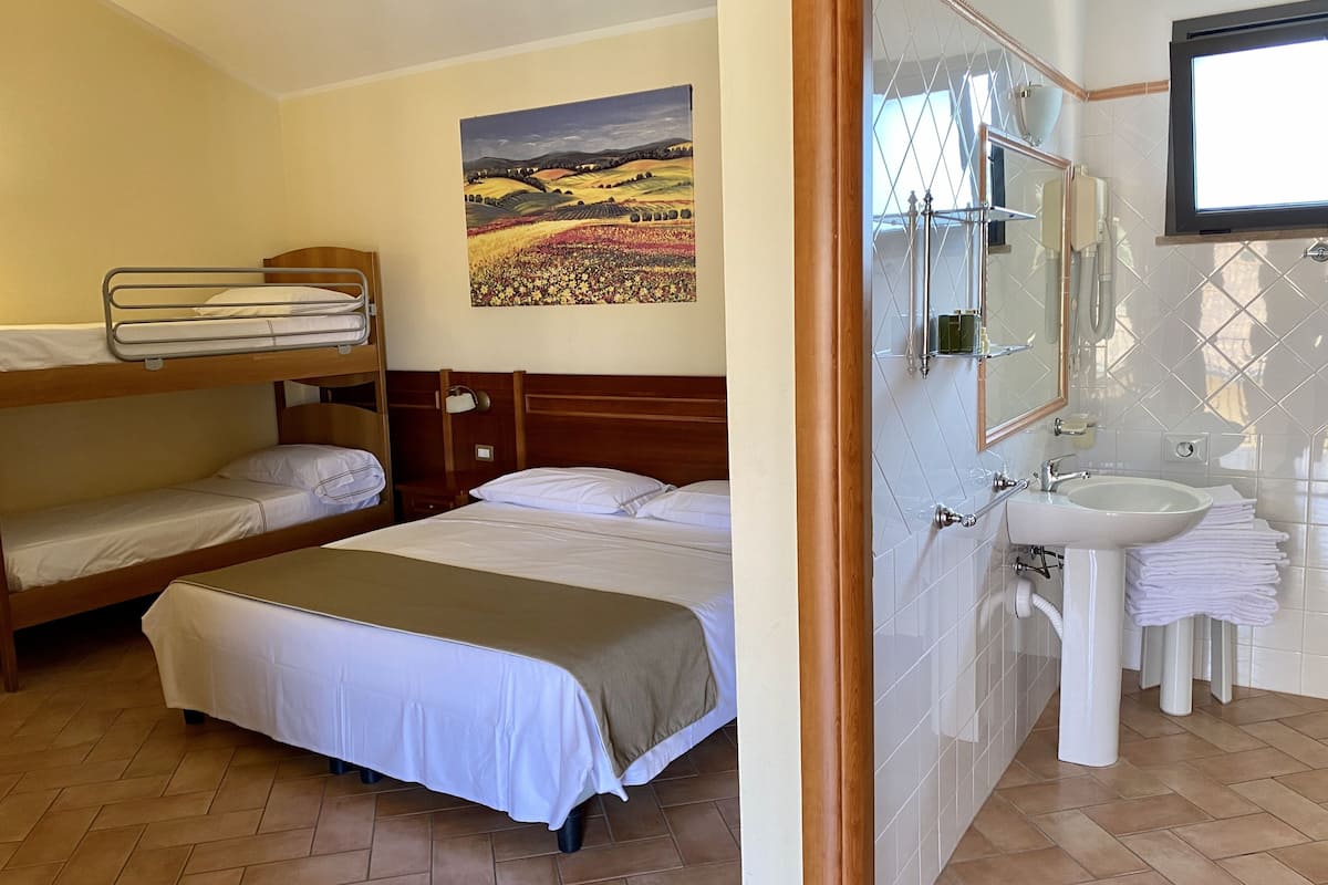 superior quadruple room | premium bedding, down duvets, minibar, in-room safe