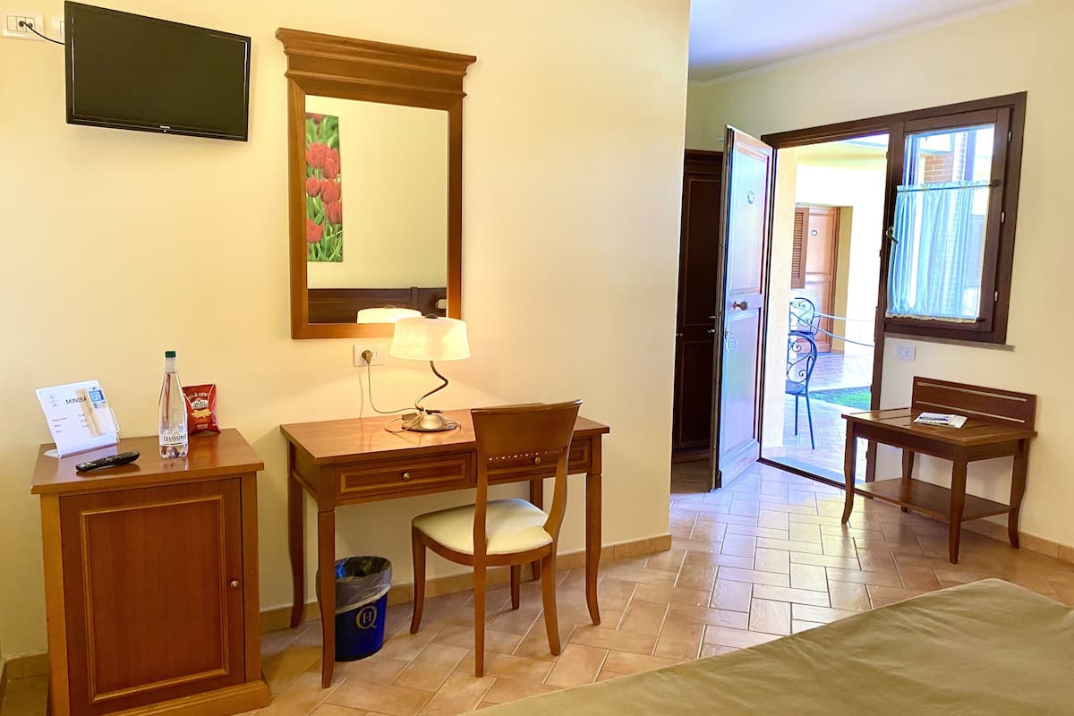 premium bedding, down duvets, minibar, in-room safe