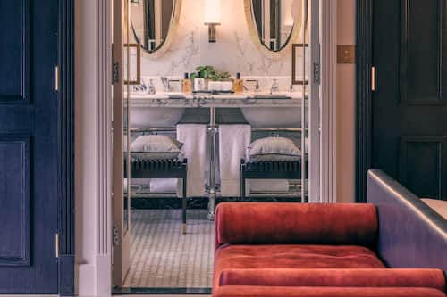 Designer toiletries, hair dryer, bathrobes, slippers