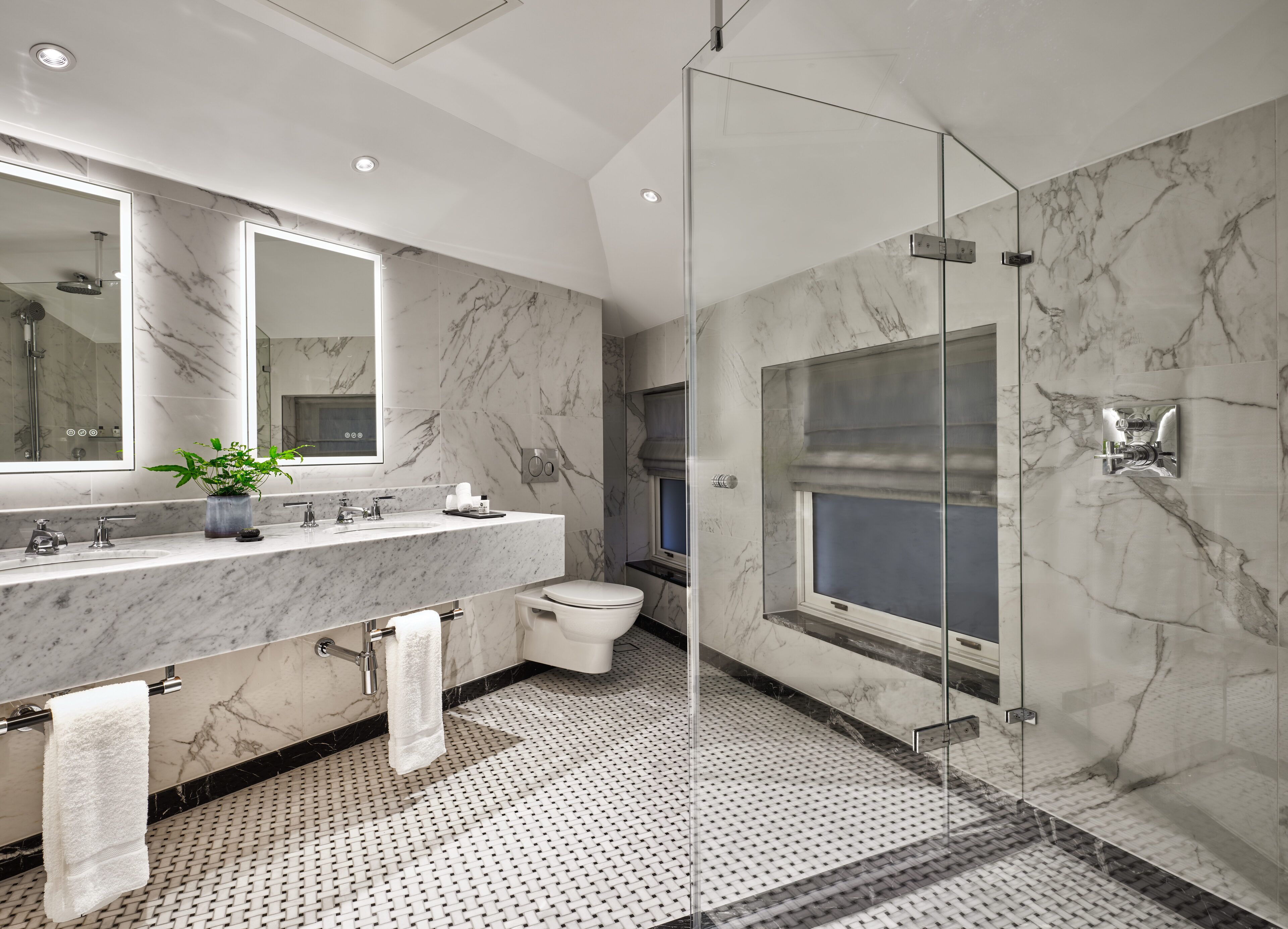 Designer toiletries, hair dryer, bathrobes, slippers