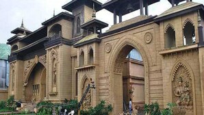 A historic building with ornate arches and a central staircase leading to an entrance. - Hotel Gateway Inn (Mumbai)