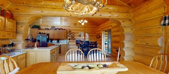Beautiful Riverfront Log Cabin with Mountain Views, Firepit, and Gas Grill