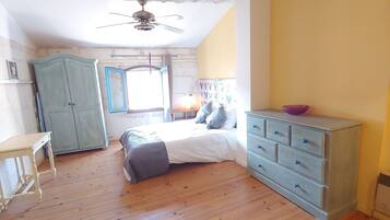 1 bedroom, desk, iron/ironing board, travel crib