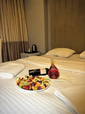 Standard Double Room | Living area | Flat-screen TV, heated floors
